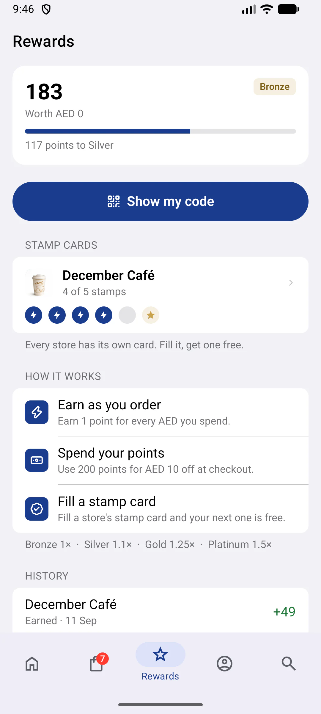Rewards screen: points balance and progress to the next tier, a Show my code button, a store's stamp card and how points work
